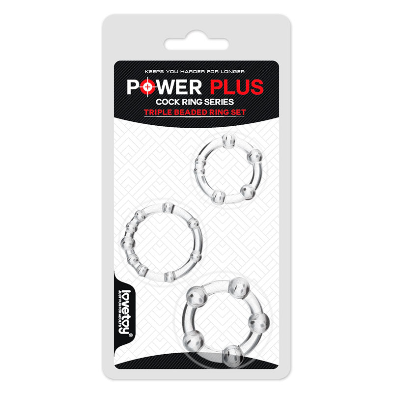 Presenting the packaging of the "Power Plus Triple Beaded Cock Ring Set" by Lovetoy, showcasing a set of three silver beaded rings in varying sizes. The rings are arranged vertically against a minimalist design with a white geometric background.