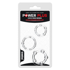 Presenting the packaging of the "Power Plus Triple Beaded Cock Ring Set" by Lovetoy, showcasing a set of three silver beaded rings in varying sizes. The rings are arranged vertically against a minimalist design with a white geometric background.