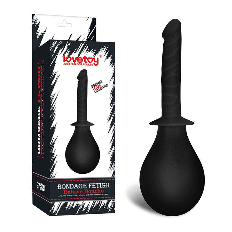 An image displays the Bondage Fetish Deluxe Douche by Lovetoy, an ideal choice for hygienic anal play. The black product features a bulb base and a uniquely twisted tapered nozzle. Beside the product stands its packaging box, showcasing consistent design and branding elements.