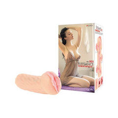 A soft, flesh-toned adult toy with a realistic texture is displayed in front of its packaging. The box features an image of a woman in lingerie sitting on a bed, posing with her hands behind her head. Experience sensational feelings with the Kokos Elegance 005, labeled "Elegance" and "EG.005" in red text.
