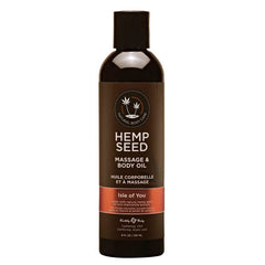 A pump bottle of Earthly Body Hemp Seed Massage & Body Oil with the label 'Isle of You'.