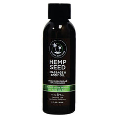 A dark-colored bottle of Hemp Seed Massage & Body Oil Naked in The Woods with a green label around the bottom, reading "Naked in the Woods." The 2 fl oz / 60 ml bottle features an all-natural hemp oil formula by Earthly Body, a natural body care company.