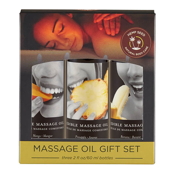 The Edible Tropical Massage Oil Trio features packaging with a relaxed woman on the top. It includes three 59 ml bottles of natural massage oil in Mango, Pineapple, and Banana flavors. The labels display close-ups of people savoring each fruit, and a "Hemp Seed Natural Body Care" seal is prominently placed on the top right to highlight its vegan skincare credentials.