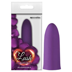 A Lush Dahlia Purple Bullet Vibrator, renowned for its powerful vibrations, is showcased beside its packaging. The box displays the same product image encircled by purple flower petals with the text "Lush, Dahlia, Rechargeable" and the brand name "nsnovelties" printed on it.
