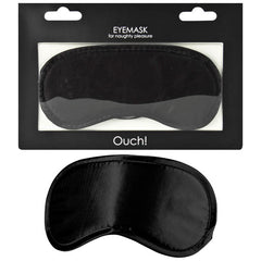 The Ouch! Black Soft Eyemask is shown in both its packaging and separately below. The packaging includes a clear window that reveals the eye mask inside. The label at the top reads "Ouch! Black Soft Eyemask," while "Ouch!" is displayed at the bottom. Made from smooth fabric, the eye mask ignites a spark of sexual lust.