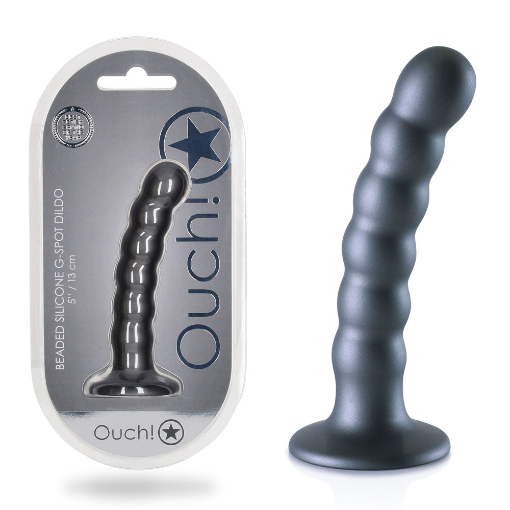 The image shows a blue 5''/13cm OUCH! Beaded Silicone G-Spot Dildo with a strong suction cup base, standing upright next to its packaging. The packaging features a clear window displaying the dildo and is labeled with "OUCH!" and "Beaded Silicone G-Spot Dildo" in metallic lettering.