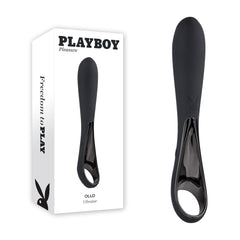 A stylish black Playboy Pleasure OLLO Vibrator is displayed alongside its packaging. The box is labeled "PLAYBOY Pleasure" with the slogan "Freedom to PLAY" on the side. Featuring 10 speeds & rhythms, this modern vibrator has an ergonomic ring handle design and showcases the iconic Playboy bunny logo at its base.