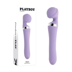 The Playboy Pleasure VIBRATO Vibrating Wand is a lavender-colored, dual-ended massager with a textured rounded head and smooth handle. It features buttons on the side and offers multiple vibrating speeds. Made from body-safe silicone, this product is displayed next to its white box labeled "Playboy Pleasure" with the phrase "Freedom to Play" on the side.