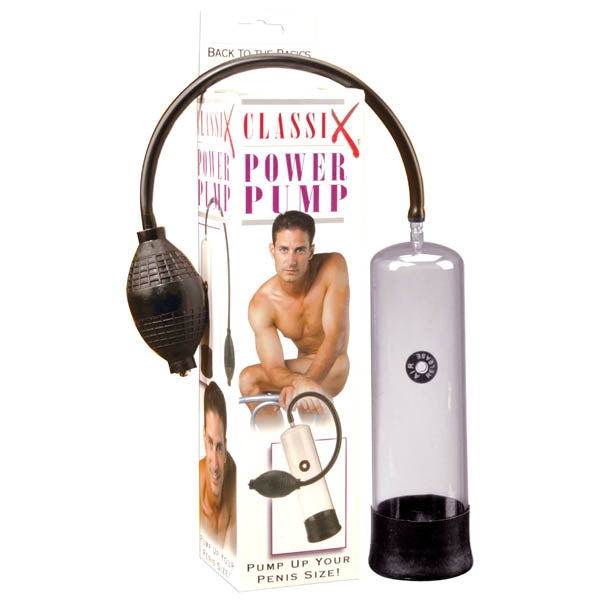 A clear cylindrical Classix Power Penis Pump with a black rubber bulb for manual pumping is displayed next to its packaging. The box showcases an image of a shirtless man kneeling, accompanied by the text "Classix Power Penis Pump" and "Pump up your penis size for the hardest erections!