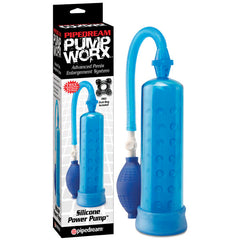 Image of the Pump Worx Silicone Power Penis Pump - Blue, a vacuum pump designed for penis enlargement and achieving rock-hard erections. This blue pump features a squeeze bulb for suction and comes in its original packaging, highlighting the product's features, including an enhancement ring.