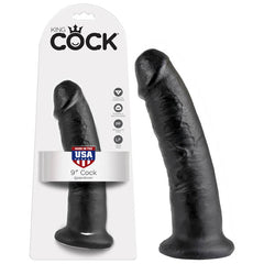 Packaging of a black 9-inch King Cock 9'' Cock Giant Dildo displayed next to the product. The packaging highlights features including being body-safe and free from latex and phthalates. The realistic dildo also features a "Made in the USA" label.