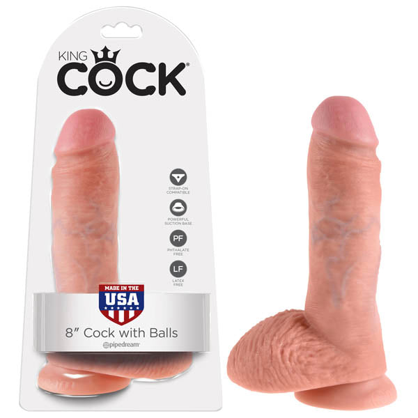 The image features the "King Cock 8'' Cock With Balls" from Pipedream Products. The packaging indicates it is an 8-inch dildo with balls, meticulously designed for a realistic experience. The toy is flesh-colored with a textured surface and is showcased both inside and outside of its packaging.