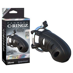 A package displaying the Fantasy C-Ringz Hardcore Silicone Cock Blocker, featuring a black silicone male chastity device with an adjustable stainless steel ring and a small metal lock. The packaging prominently showcases the name "Fantasy C-Ringz" and includes an image of this BDSM device.