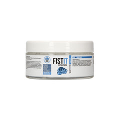 A 300ml clear plastic jar with a white lid labeled "PHARMQUESTS Fist-It Extra Thick" in bold letters. The jar contains a dermatologically tested, water-based personal lubricant, with additional product information and ingredients listed on the label. It is safe for use with latex condoms.