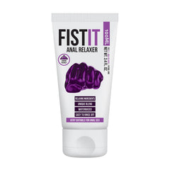 The image shows a tube of PHARMQUESTS Fist-It Anal Relaxer, which is a water-based lubricant. The packaging is predominantly white with a purple graphic of a clenched fist on the front, indicating the product's use for anal relaxation.
