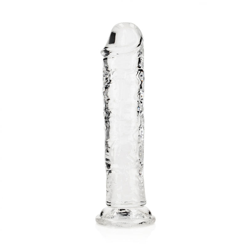 The REALROCK 20 cm Straight Dildo - Clear is a phthalate-free, transparent glass dildo featuring a smooth rounded tip and textured shaft, designed to stand upright on a flat circular base.