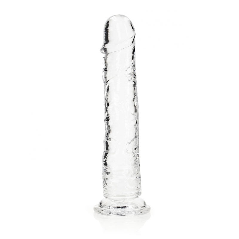 The REALROCK 31 cm Straight Dildo - Clear is showcased standing vertically against a plain white background. This body-safe toy features a smooth, phallic shape with a rounded tip and flat base. It is transparent with subtle textural details along its length, exemplifying the quality of top-tier clear dildos.