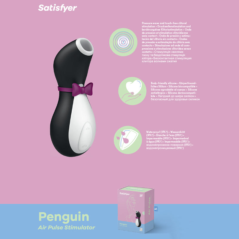 A product image of the Satisfyer Penguin Air-Pulse Vibrator. The black and white device, adorned with a pink bow tie, offers pressure wave and touch-free clitoral stimulation. Crafted from body-friendly silicone, it's waterproof, whisper-quiet, and features rechargeable batteries. Packaging is also displayed.