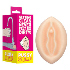 Introducing the S-Line Pussy Soap, a novelty bath product humorously shaped like female genitalia. The pink packaging features a playful illustration of hands lathering with the soap and boasts the phrases "GETTING CLEAN NEVER FELT SO DIRTY!" and "PUSSY SOAP." It's an ideal gift for bachelor parties!