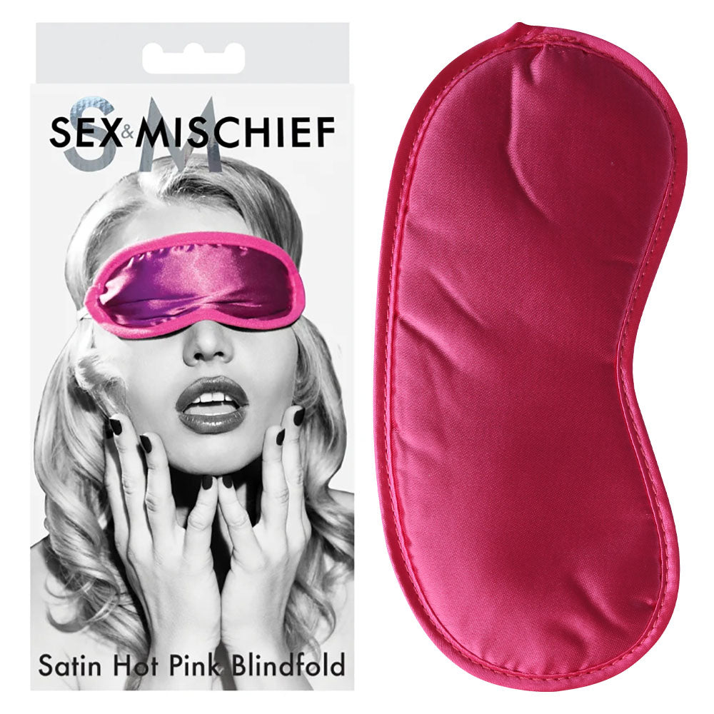 A product photo featuring a packaging box on the left with the text "Sex & Mischief Satin Blindfold Hot Pink" and an image of a woman wearing a hot pink blindfold. The satin blindfold itself, known as a BDSM essential for heightened senses, is displayed to the right of the box.