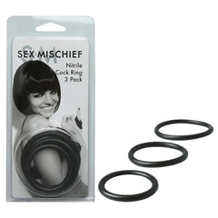 Packaging of the Sex & Mischief Nitrile Cock Ring 3 Pack featuring a smiling person on the cover. Three black circular cock rings, specifically designed to prolong ejaculation and enhance erection, are displayed adjacent to the package.