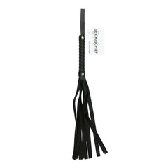 The Sex & Mischief Faux Leather Flogger is a black, vegan leather flogger featuring a textured handle and multiple long strands. The handle is reinforced with a metal rivet and has an attached tag that reads "Sex & Mischief." Designed specifically for beginners in BDSM activities, it offers an accessible entry into the scene.