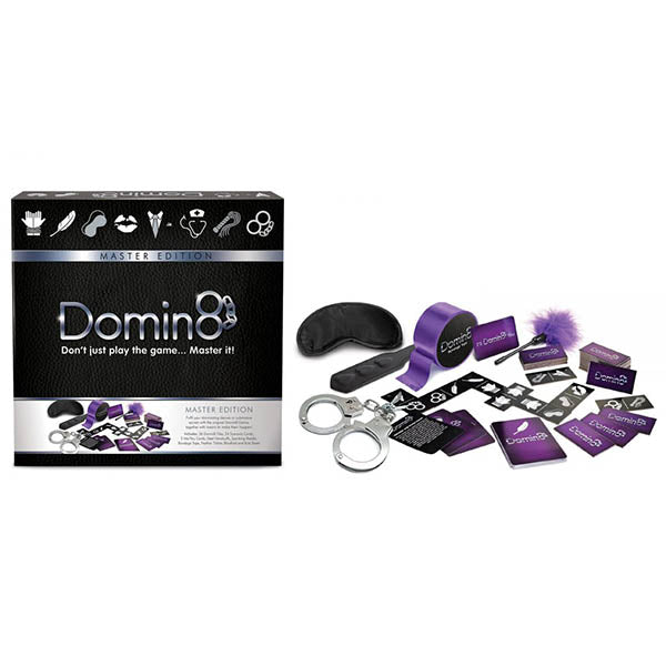 The "Domin8 Master Edition" board game, featuring game pieces such as cards, an eye mask, handcuffs, and a feather tickler, is displayed beside its box. The box showcases the tagline "Don't just play the game... Master it!" and sports a black and purple color scheme ideal for intimate settings.
