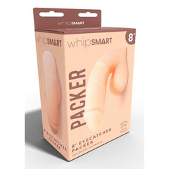 A product packaging for "WhipSmart 8'' Eyecatcher Packer - Flesh 20.3 cm Packer." The box is predominantly peach-colored, showcasing an image of the lifelike texture packer. The brand name "WhipSmart" is displayed at the top, with product details and features written on the sides.