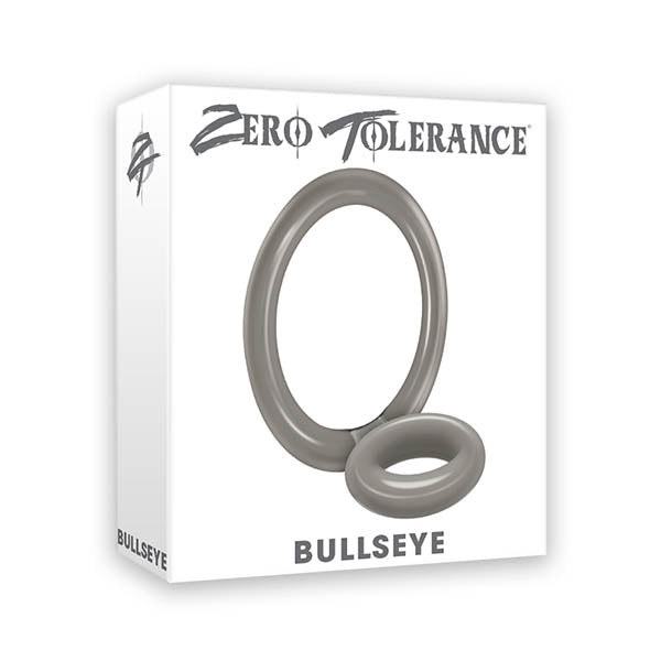 The packaging for the "Zero Tolerance Bullseye Cock Ring" features two grey circular rings of different sizes, resembling a double loop cock ring. The product name "Bullseye" is written at the bottom of the box. The smaller ring is placed in front of and partially inside the larger ring, promising longer lasting erections.