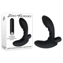 A black Zero Tolerance Rechargeable Prostate Butt Plug is displayed alongside its box. The packaging features the brand name "Zero Tolerance" and the phrase "Powerful 10 Speed Rechargeable Bullet." The massager, specifically designed for P-spot stimulation, boasts a curved design with a textured base.