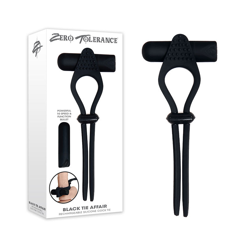 Image of an adult product in its packaging, labeled "Zero Tolerance." The product is called "Zero Tolerance Black Tie Affair Vibrating Cock Ring," and it includes a black adjustable vibrating couple’s toy with clitoral stimulation and a 16-function rechargeable bullet vibrator.